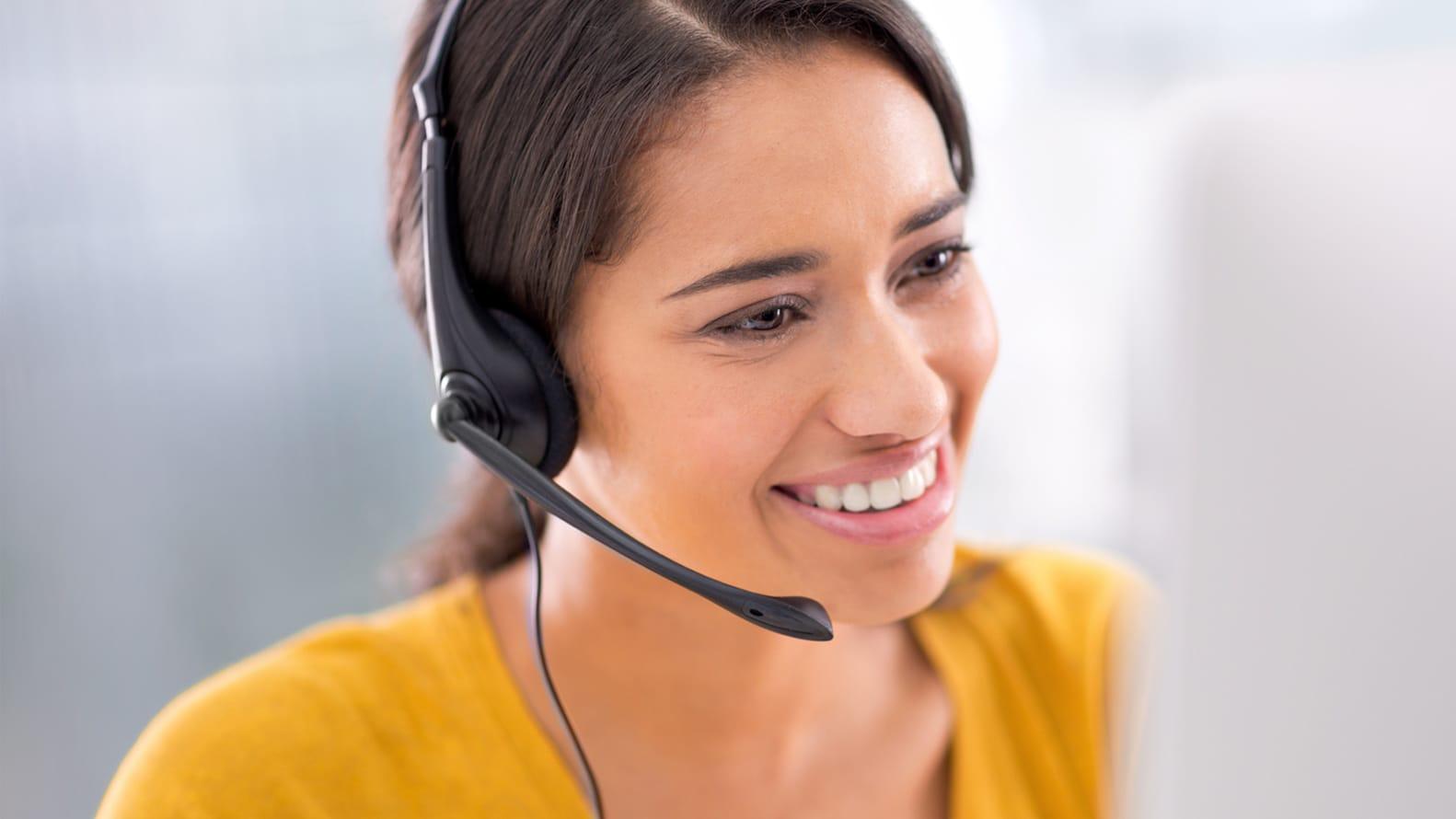 Female customer service rep wearing headset